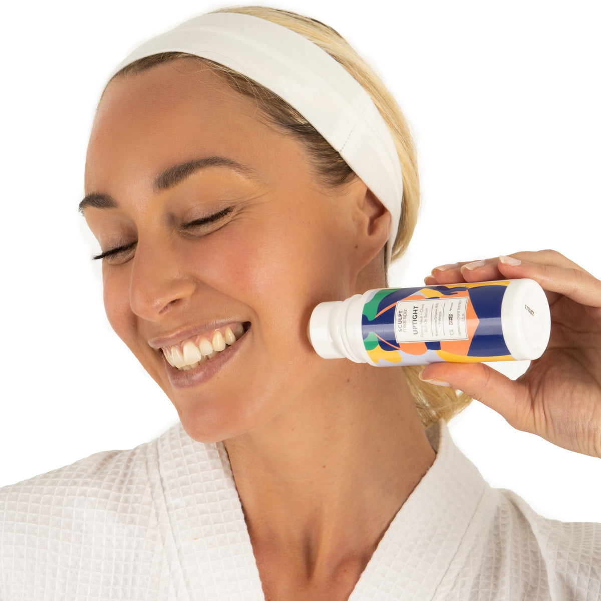 women rolling on a neck and chest serum for wrinkles and saggy skin