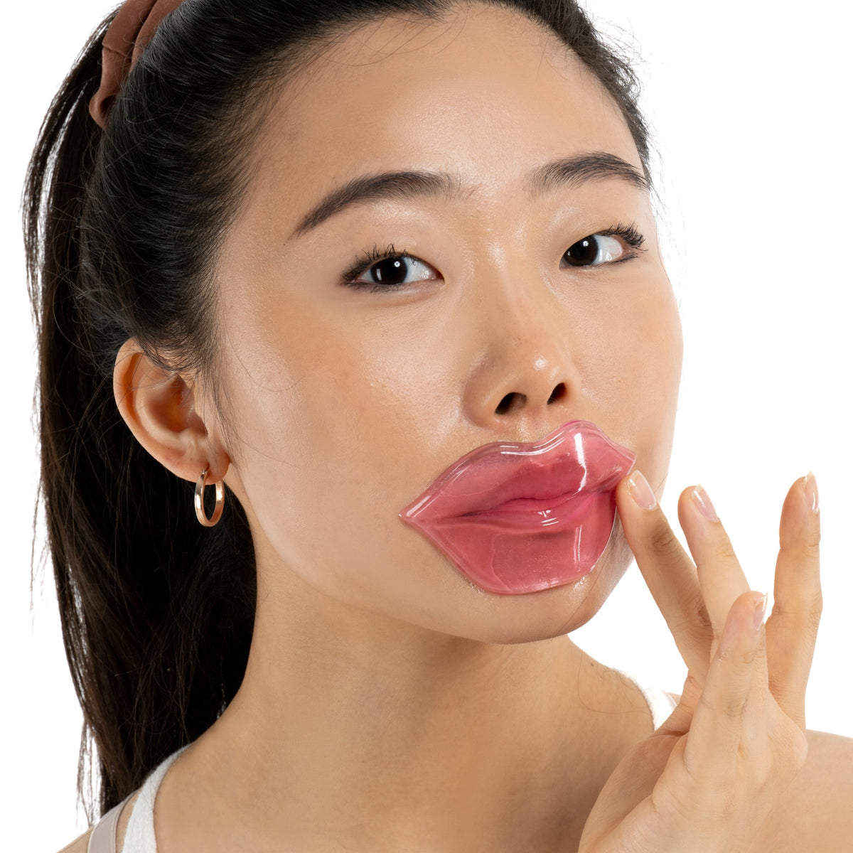 women using pink hydrogel lip mask for dry lips